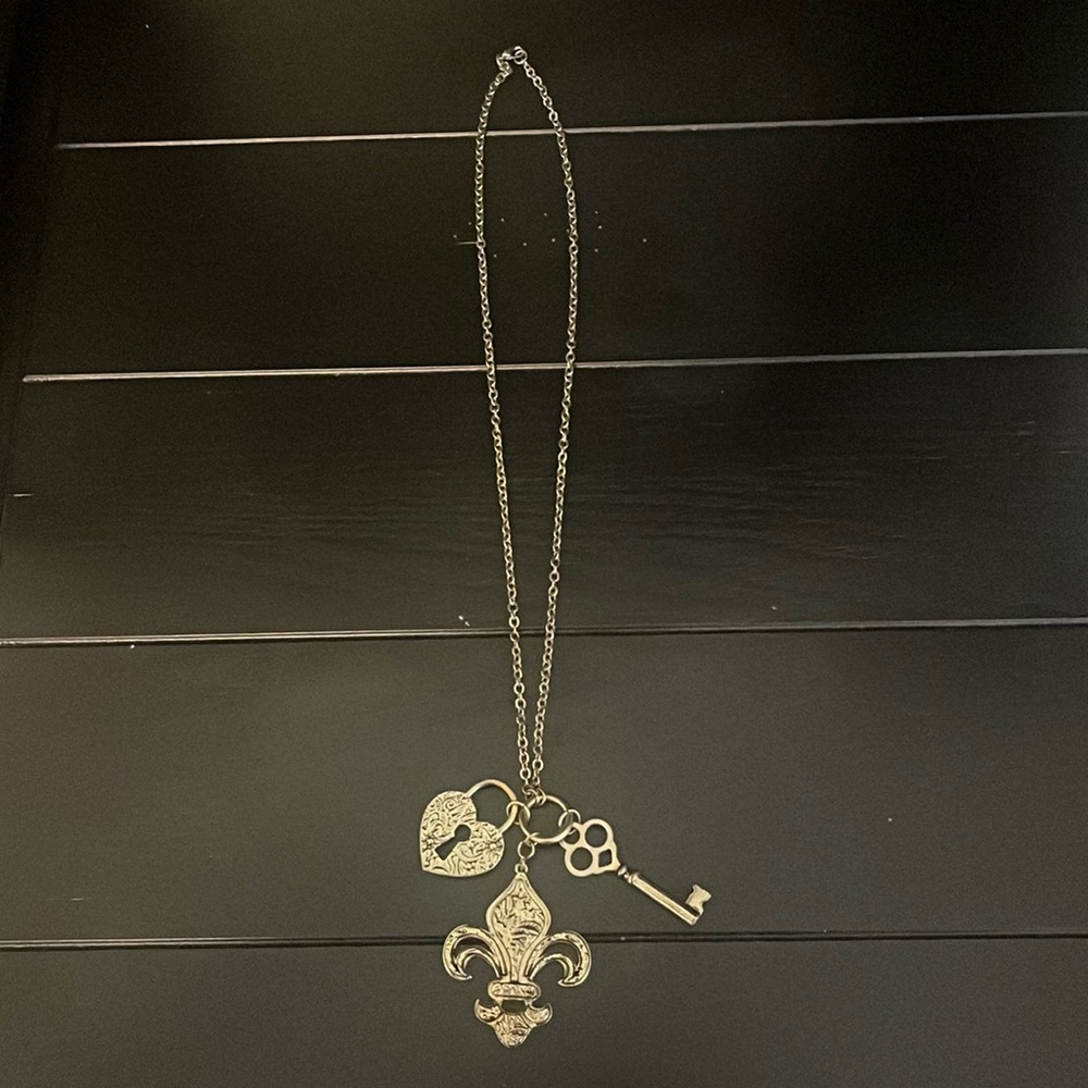 Bronze necklace with 3 large charms.
